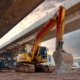 Excavator Heavy Machine At Structure Road Construction Of Expressway Under Construction