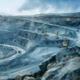 Work Of Trucks And The Excavator In An Open Pit