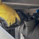 Worker Refueling Truck